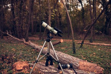 Telescope for bird and animal observing in nature. clipart