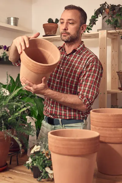 Man Repotting Taking Care Houseplants Indoors Royalty Free Stock Photos