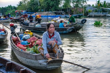 Can Tho, Vietnam - January 4, 2023: Fruit and vegetable vendors at the Phong Dien floating market in the Mekong River Delta in Can Tho, Vietnam.