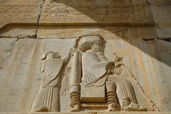stock image Marvdsaht, Iran - March 18, 2024: Reliefs at the ruins of Persepolis near the city of Shiraz in Fars province, Iran.