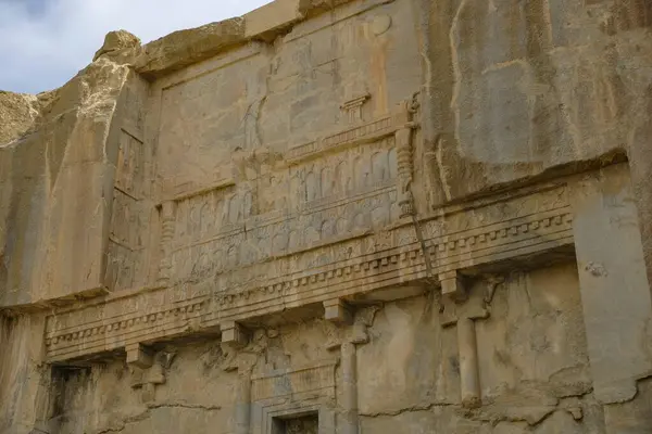 stock image Marvdsaht, Iran - March 18, 2024: Tomb of Artaxerxes III at the ruins of Persepolis near the city of Shiraz in Fars province, Iran.