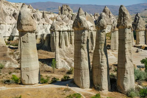 stock image Goreme, Turkey - August 15, 2024: Unique geological formations in Love Valley in Cappadocia, Turkey.