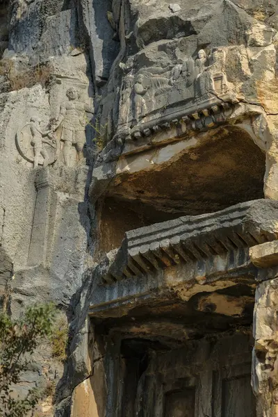 stock image Demre, Turkey - August 24, 2024: Rock-cut tombs in the ruins of Myra Ancient City in Demre, Turkey.