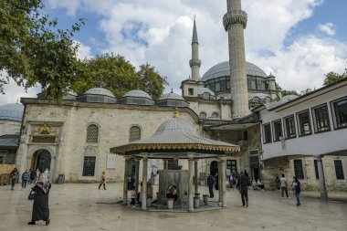 Istanbul, Turkey - September 23, 2024: People visiting the Eyup Sultan Mosque and the mausoleum of Abu Ayyub al-Ansari in Istanbul, Turkey. clipart