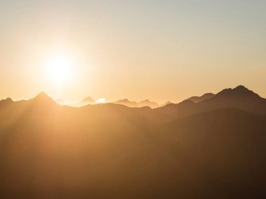 Alpine sunset mountain silhouette layers, nature landscape panorama seen from Mount Armstrong Brewster Hut West Coast Otago Southern Alps South Island New Zealand