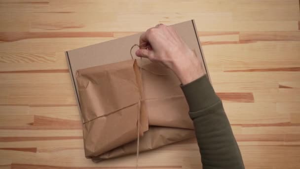 Two Men Hands Pack Package Craft Brown Paper Place Brown — 图库视频影像