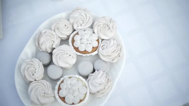 Festive Table Covered Colorful White Tablecloth Decorated Capcakes Macaroons Tarts — Stockvideo