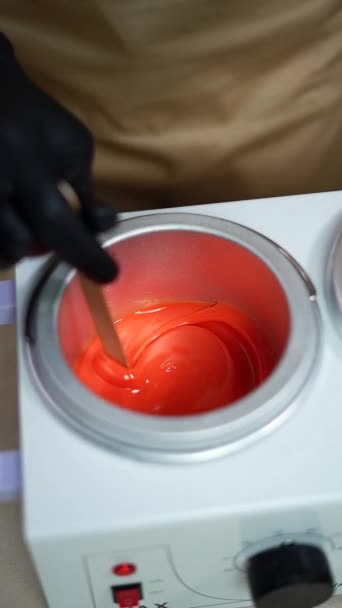 Hot Orange Wax Used Hair Removal Close Depilation Master Hands — Vídeo de Stock