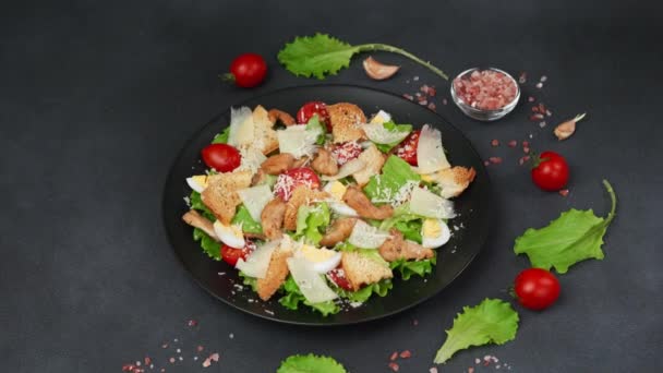 Caesar Salad Chicken Lettuce Leaves Cherry Tomatoes Grated Parmesan Black — Stock Video