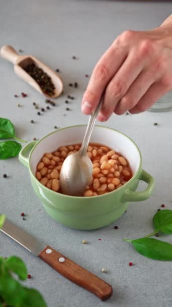 Baked Beans Tomato Sauce Plate Grey Background Man Hand Spoon — Stock Video