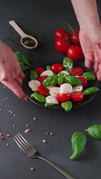 Caprese Salad Ripe Tomatoes Mozzarella Cheese Fresh Basil Leaves Black — Stock Video