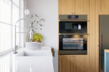 Ahşap dolapları ve yeşil cepheleri olan büyük pencereli mutfak aletleri ve mutfak aletleri olan mutfak. Mutfakta musluk varken mutfak lavabosundaki aksan. 3B görüntüleme