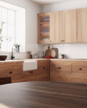 Zarif ahşap dolapları olan şık bir mutfak, büyüleyici bir çiftlik evi lavabosu ve aile için rahat bir yemek alanı. 3d hazırlayıcı