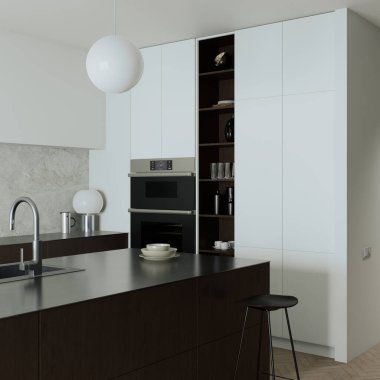 Bu şık modern mutfak, karanlığı ve aydınlığı güzelce birleştiren gösterişli bir minimalist tasarım sergiliyor.