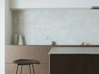 Bu zarif malzemeler ve yumuşak tonlarla donatılmış minimalist bir tasarım sergileyen modern bir mutfak.