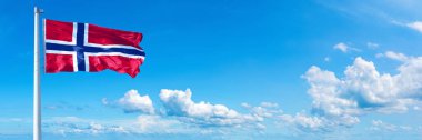 Norway Flag - state of Europe, flag waving on a blue sky in beautiful clouds - Horizontal banner