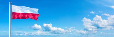 Poland Flag - state of Europe, flag waving on a blue sky in beautiful clouds - Horizontal banner