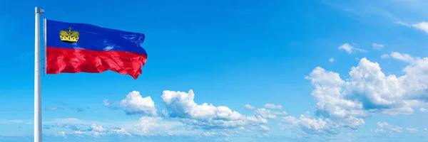 Liechtenstein Flag State Europe Flag Waving Blue Sky Beautiful Clouds — Fotografie, imagine de stoc