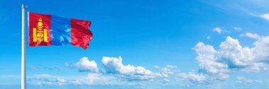 Mongolia Flag - state of Asia, flag waving on a blue sky in beautiful clouds - Horizontal banner