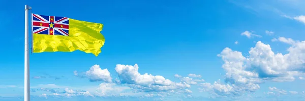 Niue Flag State Australasian Flag Waving Blue Sky Beautiful Clouds — стоковое фото