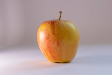 from the trees, fresh and organic apples with white background from farmers in the highlands