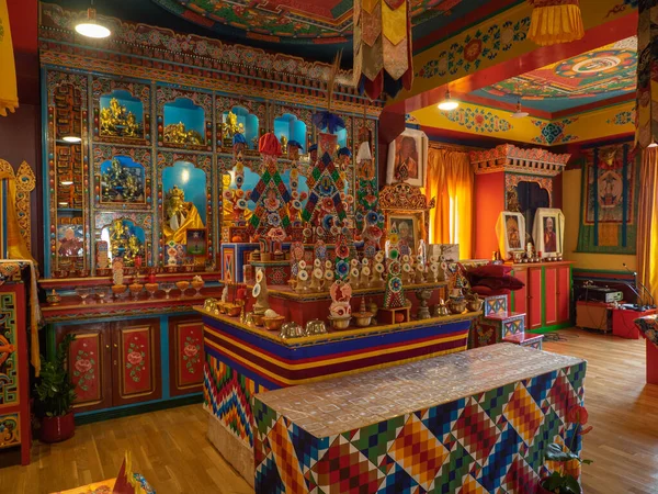 stock image Panillo, Spain. February 27, 2022. Buddhist temple altar with offerings, symbols, Buddhas.