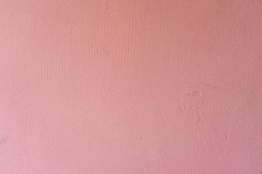 İnce detaylarla donatılmış minimalist pembe desenli bir duvar..