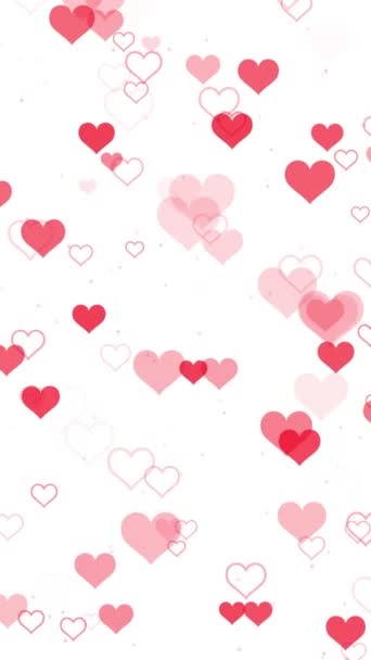 抽象的なロマンス 赤い心臓の形状の美しい粒子が白い背景に脈動する垂直動きの背景 ロマンチックな愛のパーティーやバレンタインデーのための装飾的なビデオアニメーション — ストック動画