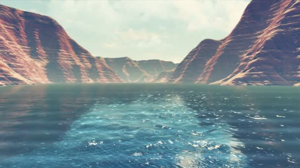 在阳光明媚的夏日 峡谷山景 镜面为平静的河流或湖水 在红带岩石之间穿行 没有人自然背景的3D动画在4K中呈现 — 图库视频影像