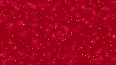 Canlandırılmış dairesel şekilli bokeh parçacıkları ve kırmızı zeminde parıldayan parlak altın kıvılcımlı konfetileri olan soyut bir festival videosu. Doğum günü veya Noel kutlaması için dekoratif animasyon.