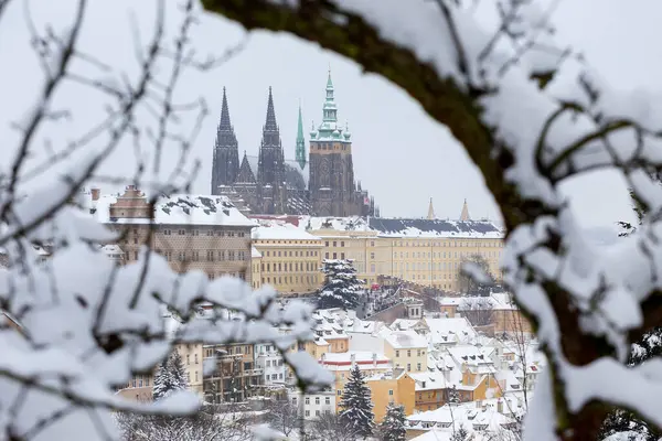 stock image Snowy Prague City with gothic Castle from the Hill Petrin, Czech republic 