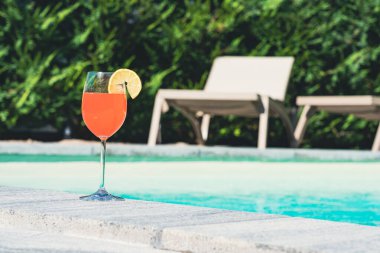 Refreshing Summer Cocktail by the Poolside clipart