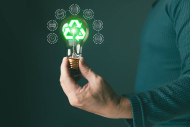 küresel ısınma, iklim değişikliği, ekoloji dostu yatırım, ESG çevre sosyal yönetim, Yeşil İş İnovasyonu ve Sürdürülebilir Kalkınma kavramının sürdürülebilirliği ve azaltılması için ampul bulundurmak.