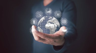 Dijital dünyanın birbirine bağlanmasını temsil eden küreyi barındırır. Arama, grafik, alışveriş arabaları, ampuller ve dünyanın dört bir yanında bulunan ikonlar, teknoloji ve iş dünyasının büyük olanaklarını simgeliyor..