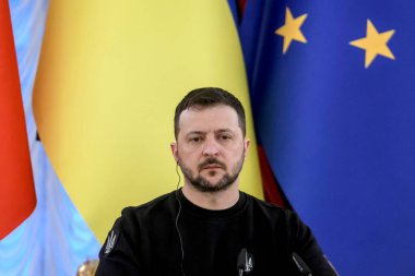 Ukrayna Cumhurbaşkanı Volodymyr Zelenskiy 24 Şubat 2024 tarihinde Ukrayna 'nın başkenti Kyiv' deki Rus işgalinin ikinci yıldönümünde düzenlediği basın toplantısına katılıyor.. 