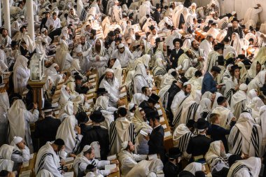 Ultra-Orthodox Jewish Hasids pilgrims pray in Synagogue of Bratslav Hasidim close to tomb of Rabbi Nachman on the eve of Rosh Hashanah holiday, Jewish New Year, in Uman, Ukraine 17-09-2023 clipart