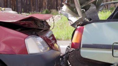 Traffic accident on the street, two damaged cars after a collision in the city. Accident due to speeding and alcohol intoxication. Transport background. The concept of road safety and insurance