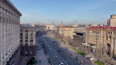 Aerial view of Khreshchatyk street in Kyiv. Maidan Nezalezhnosti in the capital of Ukraine. City life on Central Square. Pedestrians and vehicular traffic. Ukraine, Kyiv - January 2, 2024