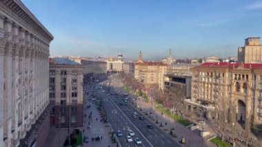 Aerial view of Khreshchatyk street in Kyiv. Maidan Nezalezhnosti in the capital of Ukraine. City life on Central Square. Pedestrians and vehicular traffic. Ukraine, Kyiv - January 2, 2024