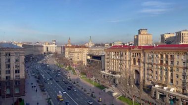 Aerial view of Khreshchatyk street in Kyiv. Maidan Nezalezhnosti in the capital of Ukraine. City life on Central Square. Pedestrians and vehicular traffic. Ukraine, Kyiv - January 2, 2024