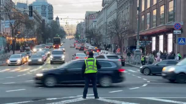 Police Traffic Controller Safety Vest Directs Traffic Helps Vehicles Cross — Stockvideo
