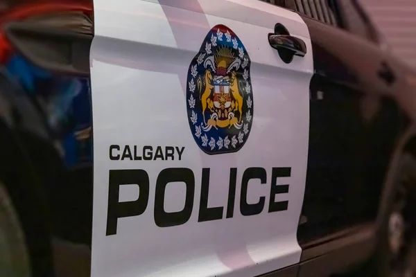 stock image Calgary, Alberta, Canada. Jun 16, 2023. A close up to a Calgary Police vehicle sign.