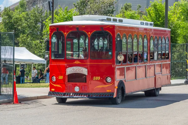 stock image Calgary, Alberta, Canada. Jun 27, 2023. A Calgary Stampede trolley tours bus shuttle.