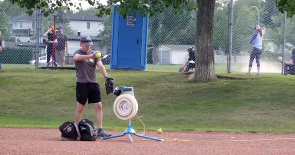 Calgary Alberta Canada July 2023 Person Using Softball Pitching Machine — Stock Video
