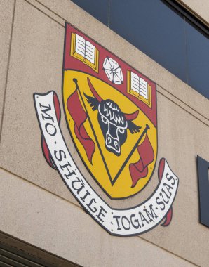 Calgary, Alberta, Canada. Sep `16, 2023. A close up to a University of Calgary sign at a campus building. clipart