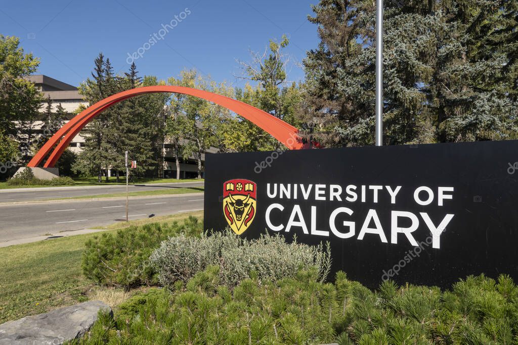Calgary, Alberta, Canada. Sep `16, 2023. The University of Calgary main entrance sign surrounded by the splendor of summer.