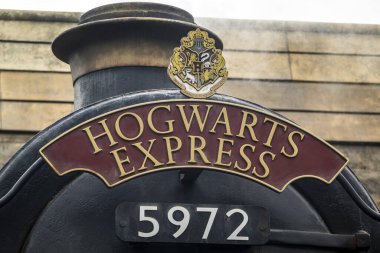 Osaka, Japan. Nov 11, 2023. Close up to the Hogwarts express train a Harry Potter themed area at Universal Studios Japan. clipart