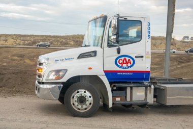 Calgary, Alberta, Canada. Apr 24, 2024. The front profile view of an AMA or CAA Alberta Motor Association truck on the road. clipart