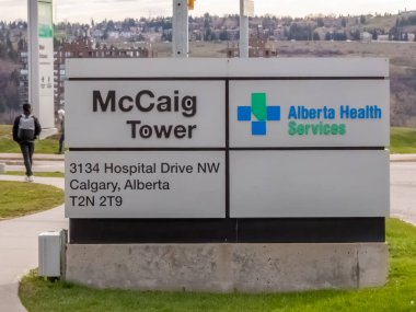 Calgary, Alberta, Canada. May 10, 2024. A sign of the McCaig Tower serves all the Foothills Medical Centre surgical facilities. clipart