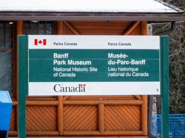 Banff, Alberta, Canada. Dec 10, 2024. A Banff Park Museum National Historic site sign. Located in the heart of downtown Banff. clipart